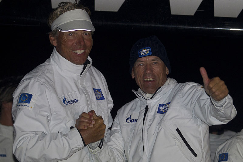 ...Neu-Skipper Jochen Schümann freut sich mit dem slowenischen Eigner Ivo Simcic als erste Yacht im Ziel zu sein... Rolex / Carlo Borlenghi