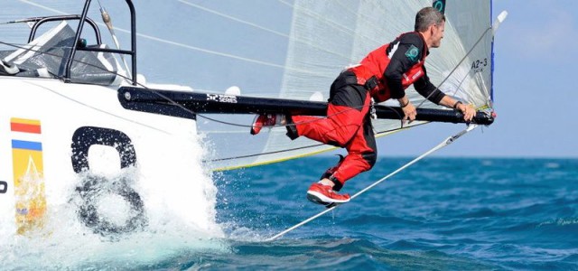Ritt auf dem Bugspriet bei der TP52 WM vor Miami.