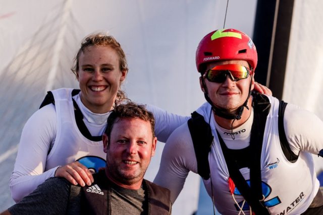 Die deutsche Erfolgscrew mit Coach Marcus Lynch. ©Sailing Energy / Oman Sail